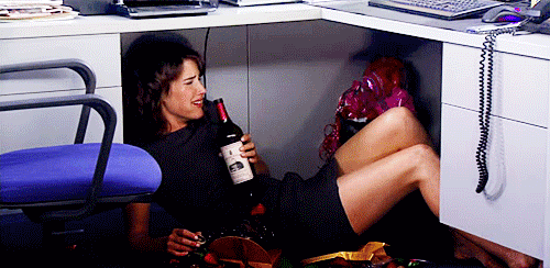 Robin-Cries-Under-A-Desk-With-A-Bottle-Of-Wine-How-I-Met-Your-Mother